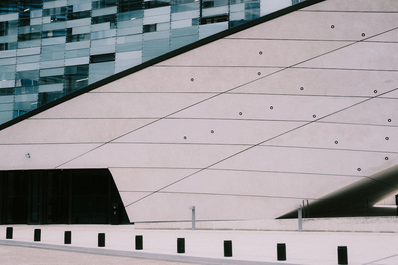 ours-journey Contemporary building facade featuring sleek lines and modern geometric design elements.